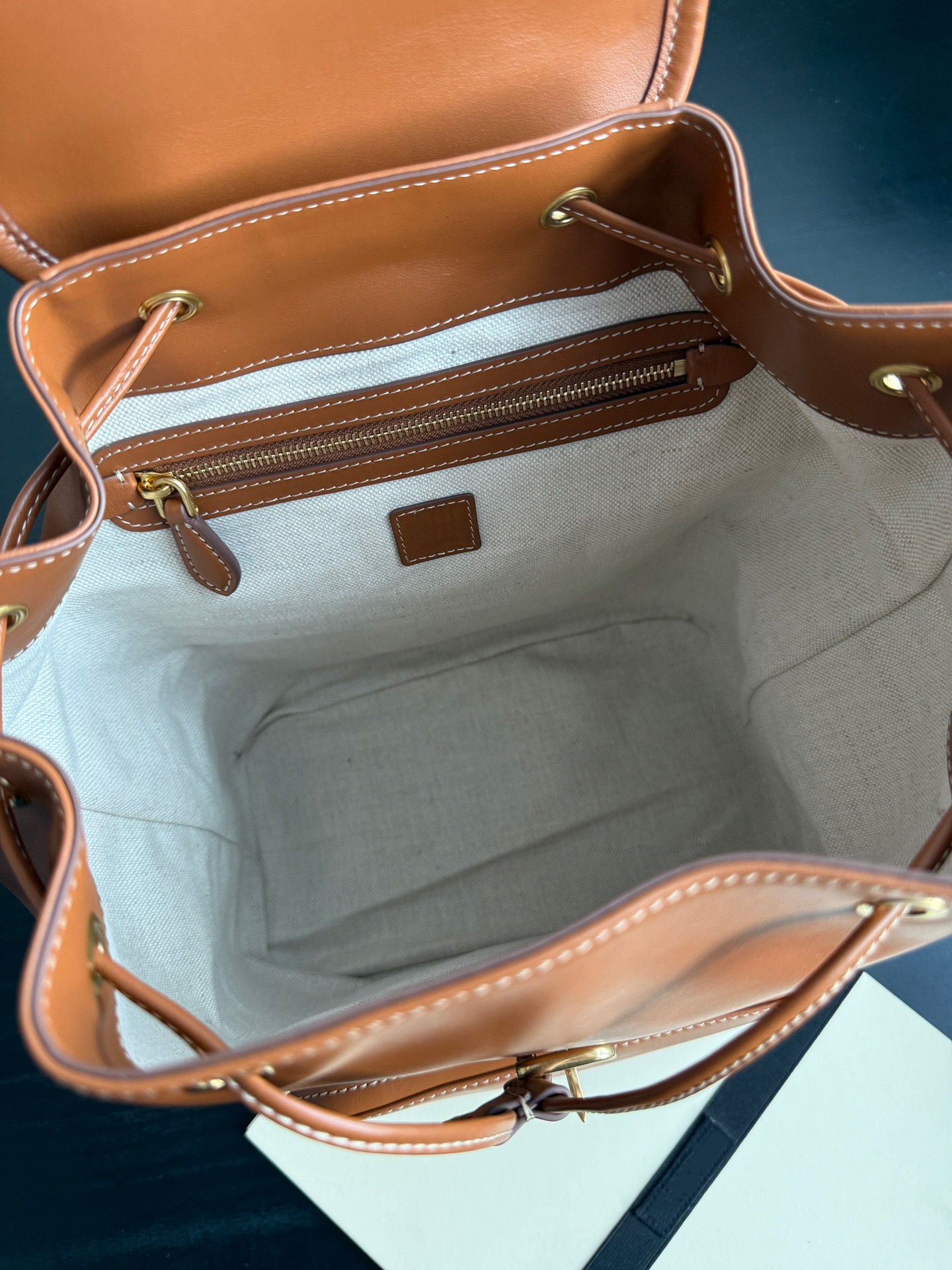 Warm Caramel Drawstring Leather Backpack, Matching Leather Top Handle Adjustable Wide Shoulder Straps Gold Ring Hardware Mini Daypack, Soft Bucket Silhouette Matching Minimal Daily & Vacation Outfits