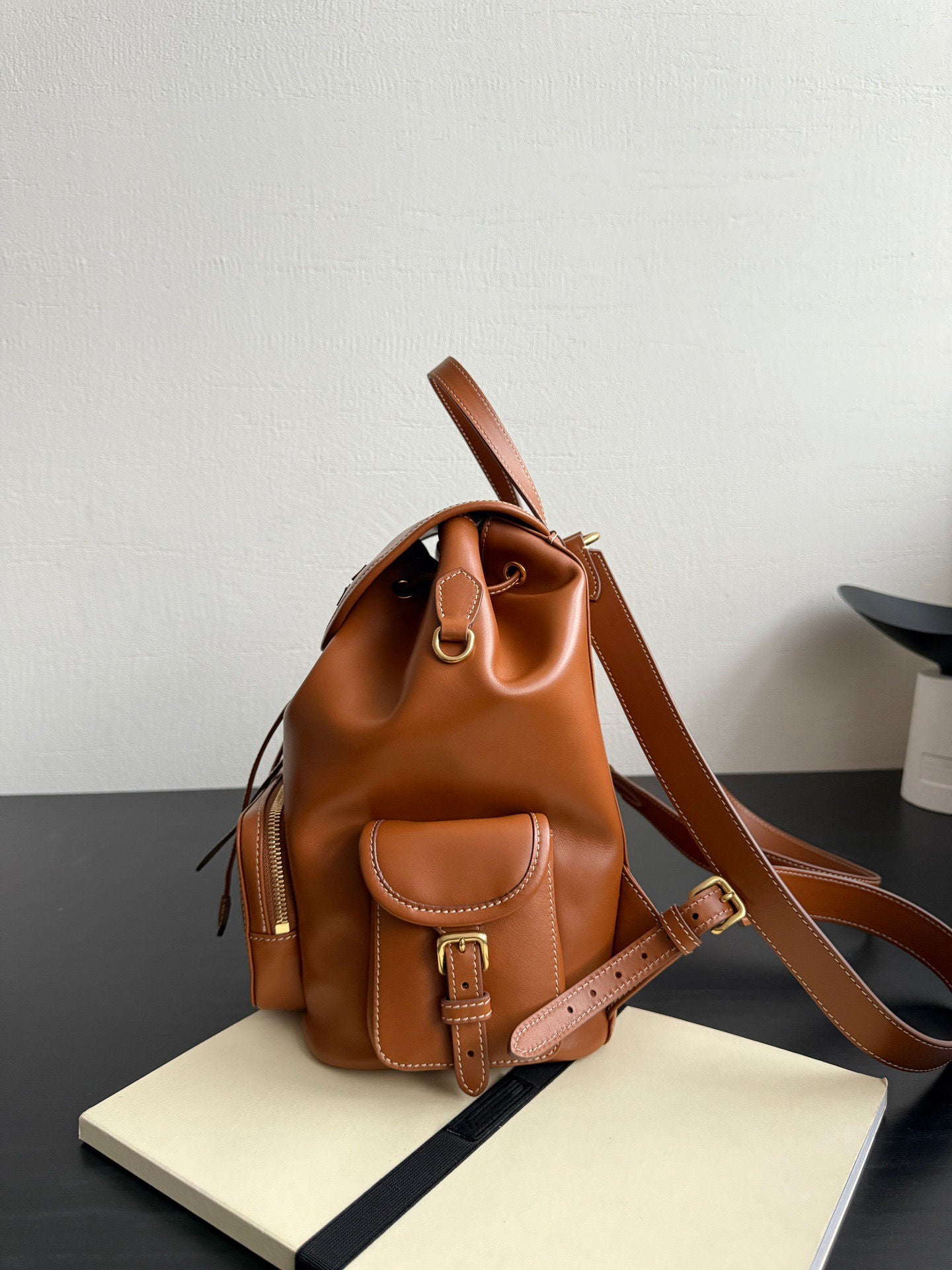 Warm Caramel Drawstring Leather Backpack, Matching Leather Top Handle Adjustable Wide Shoulder Straps Gold Ring Hardware Mini Daypack, Soft Bucket Silhouette Matching Minimal Daily & Vacation Outfits